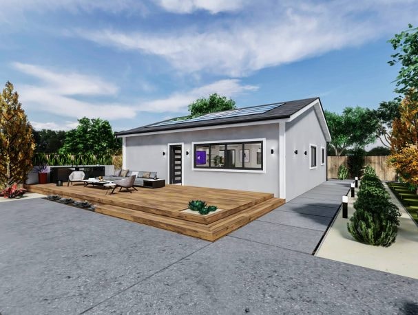 Completed 1,200 sq ft ADU exterior — modern white finish with wood deck